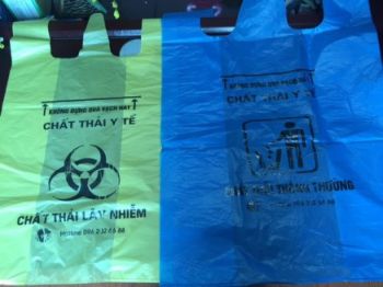 TÚI NYLON CÓ QUAI XÁCH CÓ IN BIỂU TƯỢNG,  MÀU SẮC THEO QUI ĐỊNH KÍCH CỠ